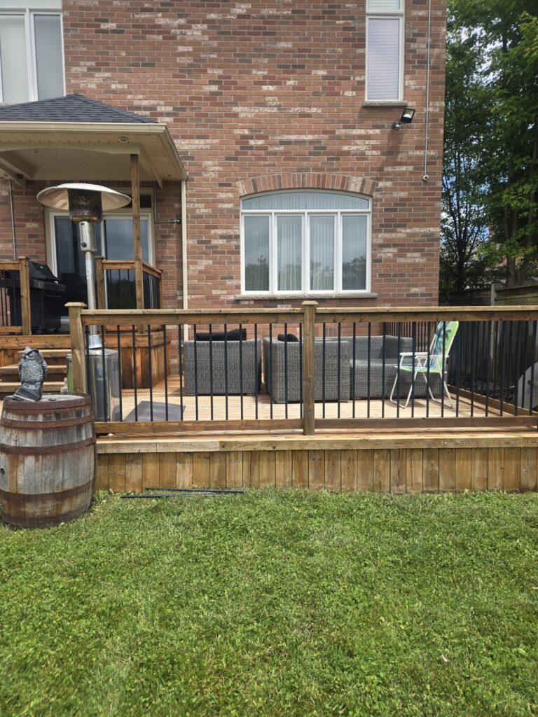 Professional deck and patio cleaning service restoring wood and stone outdoor surfaces in North York